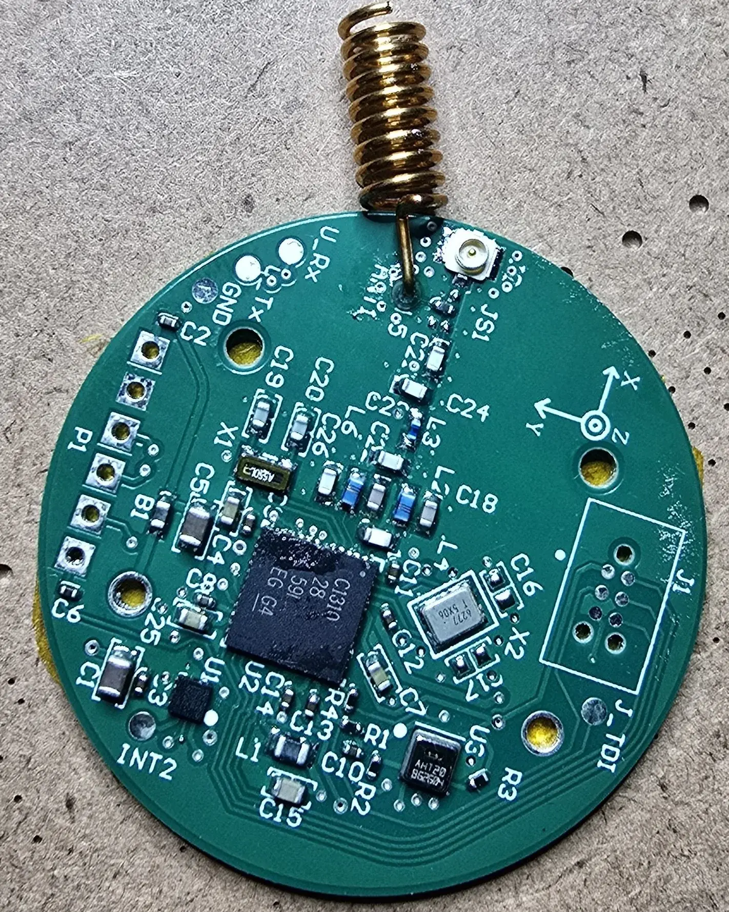 Custom Sub-GHz sensor platform under development on an electronics test bench.